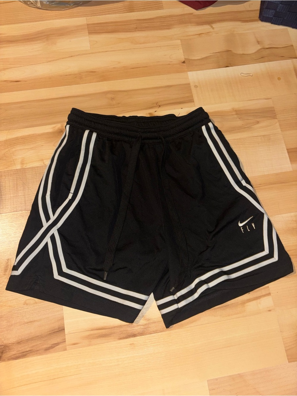 Nike Men’s Black Athletic Shorts with White Stripe Accents